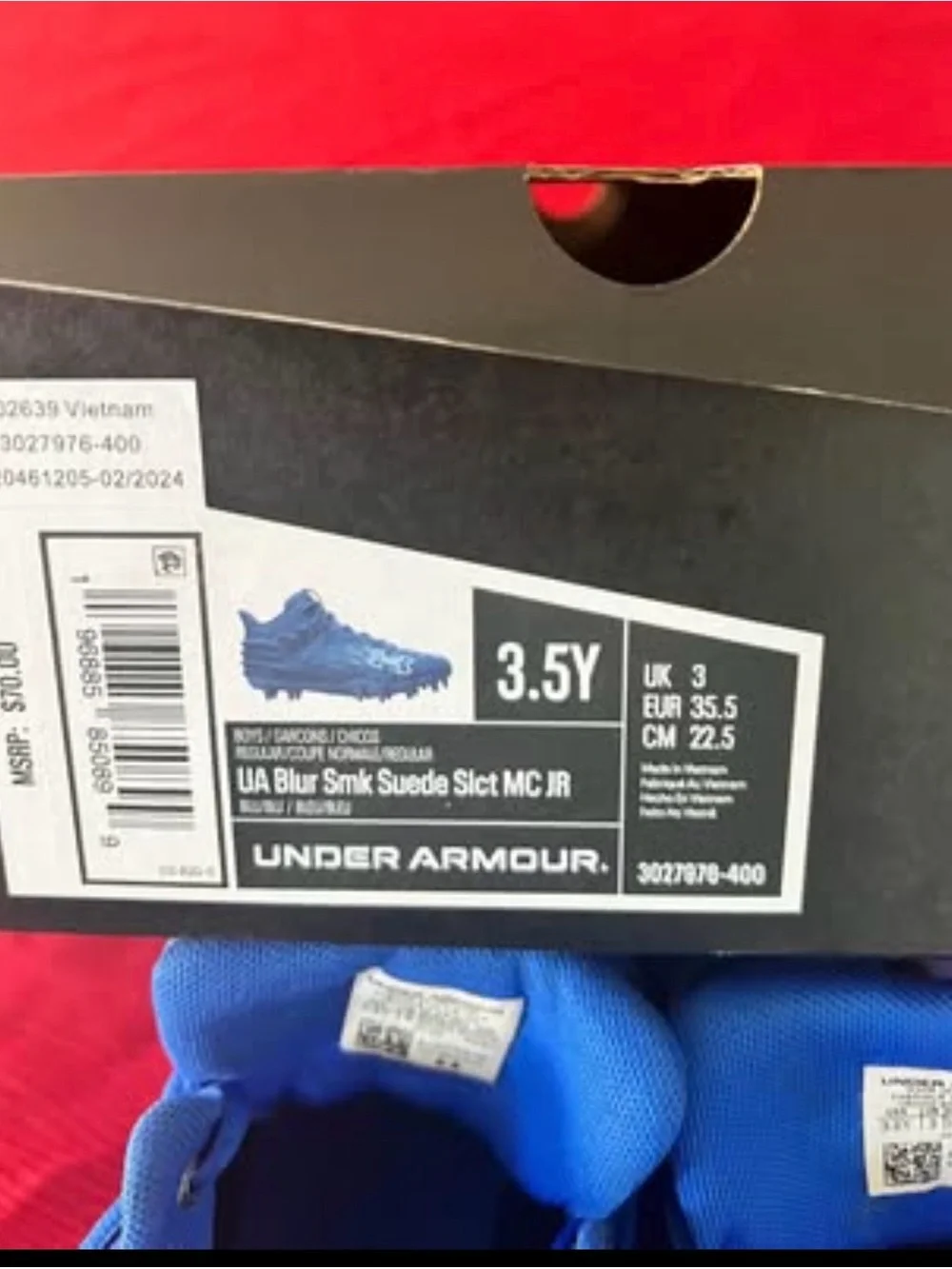 Under Armour Kids' Blue Athletic football cleats size 3.5